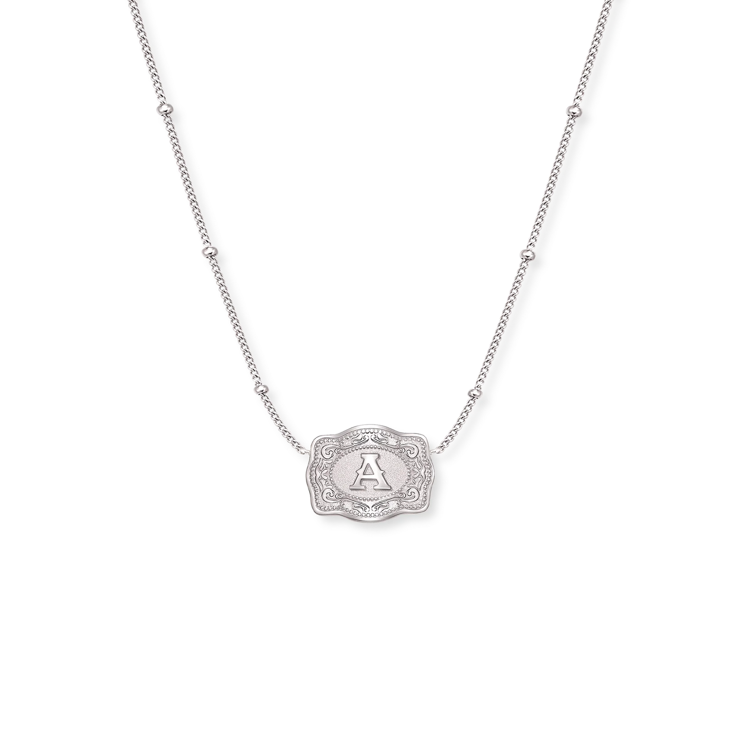 Gold necklace with a decorative pendant on a white background